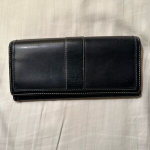 Vintage black Coach billfold wallet.